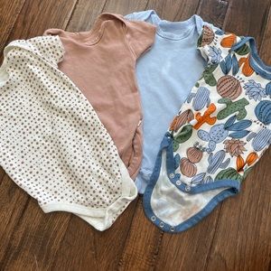 Honest Co lot of 4 onesies
